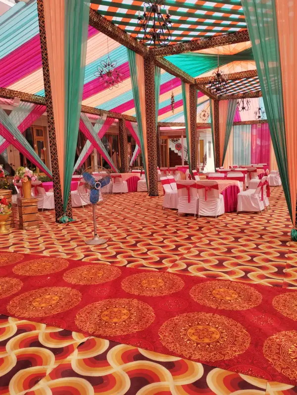 Spacious decorated banquet tent set for a function