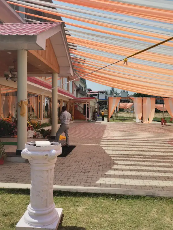 Jagan Palace exterior with an event canopy over the courtyard